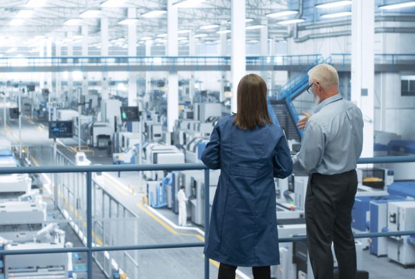 Feature male and female engineers manufacturing waste management case study