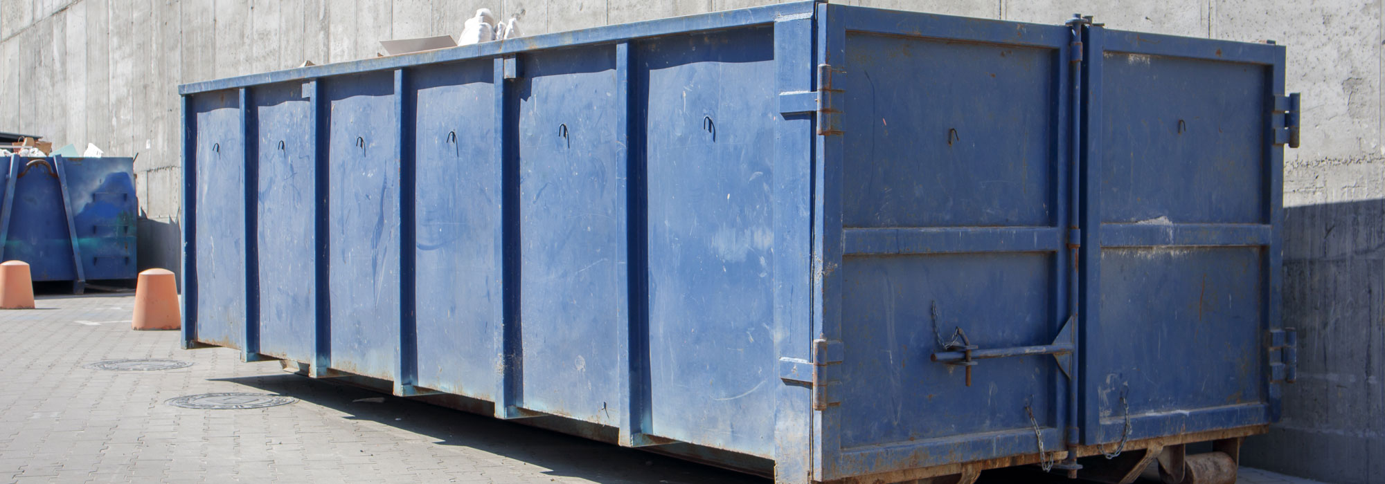 Blue industrial skip manufacturing waste containers